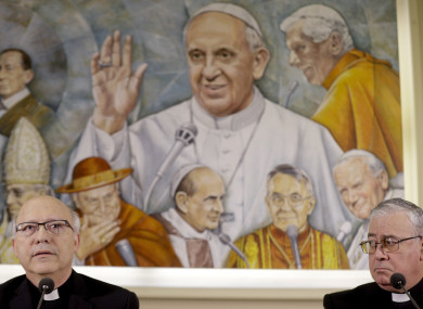 Chilean bishops Luis Fernando Ramos Perez, left, and Juan Ignacio Gonzalez, meet reporters at the Vatican