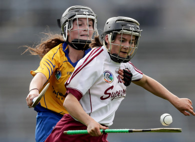 Aoife Donohue and Ciara Doyle battle for possession.