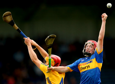 Clare's Mike Gough and Devon Ryan of Tipperary.