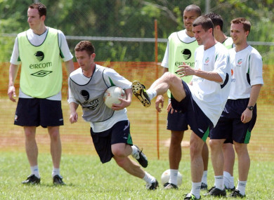 Roy Keane joins in team exercises Wednesday 22nd May 2002 in Saipan.