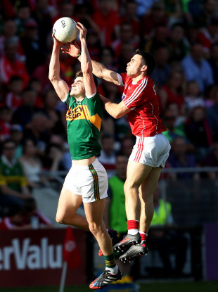 Kerry's Sean O'Shea in action against Cork's Stephen Cronin.