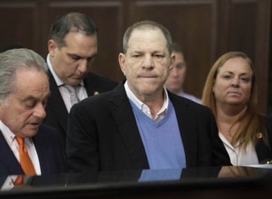 Harvey Weinstein (centre) listens during a court proceeding in New York.