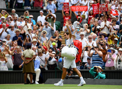 Standing ovation: Federer eased through on Monday afternoon.