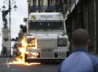 petrol bomb is thrown at a police van as trouble flairs after the Apprentice Boys of Derry parade in Derry in 2015.