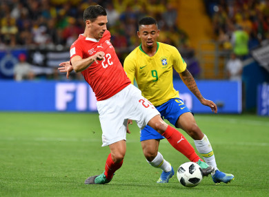 Switzerland's Fabian Schaer under pressure from Gabriel Jesus of Brazil at the 2018 World Cup.