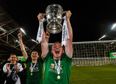 Achille Campion celebrates with the FAI Cup after Cork City's win over Dundalk in last November's final.