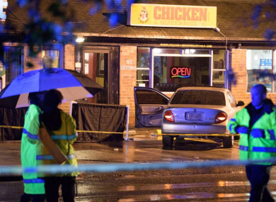 Investigators at the scene of the shooting in New Orleans.