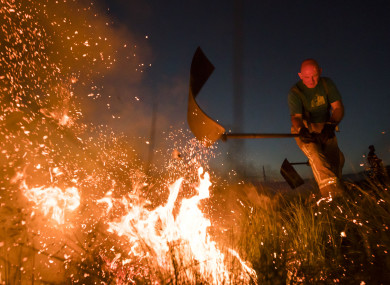 Firefighters tackle a wildfire on Winter Hill near Bolton earlier this week.