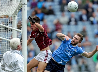 Jack McCaffrey is denied a Dublin goal by Galway's Sean Kelly.