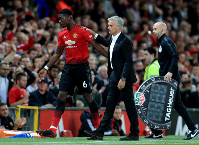 Paul Pogba with Jose Mourinho after the Manchester United star's substitution against Leicester City.