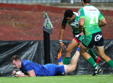 Rory O'Loughlin dives over for Leinster's first try.