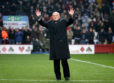 Former Aston Villa manager Ron Saunders salutes the Villa Park crowd in 2006.