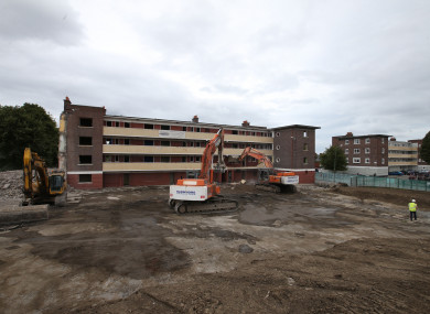 Residents watch as Demolition crews start to demolish final block in St Teresa's Gardens in Dublin in 2016