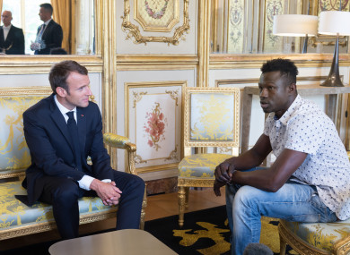 Mamadou Gassama meeting French President Emmanuel Macron after rescuing the boy