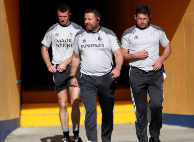 Kildare boss Cian O'Neill with Ronan Sweeney and Enda Murphy.