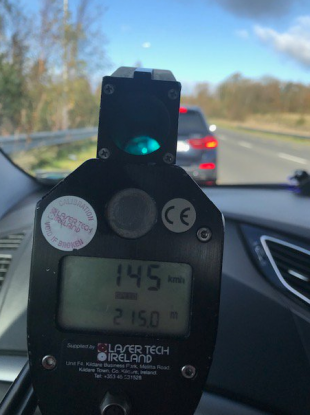 A garda speed detector reading 145 km/h.
