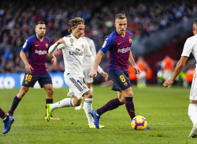 Arthur in action against Real Madrid's Luca Modric in the recent El Clasico.