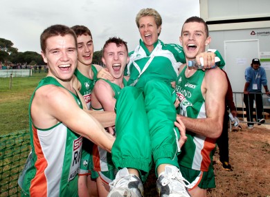 The Irish Men's U23 team of, David Rooney, Michael Mulhare, Brendan O'Neill and David McCarthy celebrate winning gold with coach Anne Keenan-Buckley.