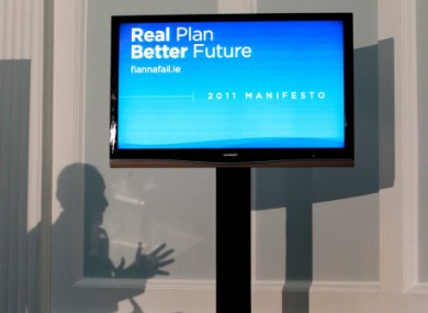 Fianna Fail leader Micheal Martin (seen in silhouette, left) launches his party's General Election manifesto in the Hugh Lane Gallery, Dublin on Monday.