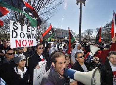 Protestors waving Libyan flags gathered in front of the White House in Washington, Saturday, Feb. 19, 2011.