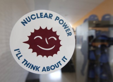 A sticker is taped on a glass door at the nuclear plant in Tihange, Southeast of Brussels, Wednesday, March 16, 2011.