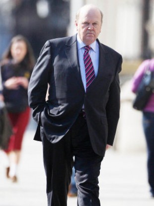 Finance Minister Michael Noonan arrives at Leinster House in Dublin.