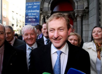 Enda Kenny emerging from mass at St Anne's Church, near Leinster House, this morning