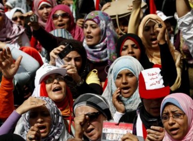 Egyptian women chant slogans as they attend a demonstration in Tahrir Square in Cairo, Egypt, Friday, April 1, 2011.