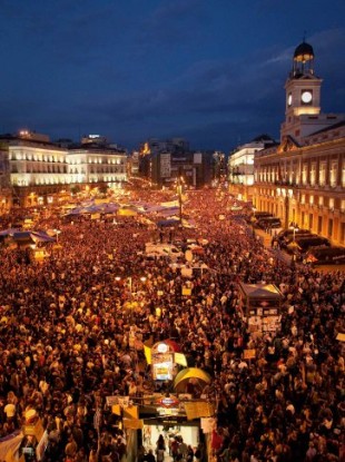 Tens of thousands of people take part in a demonstration in Madrid, Saturday, May 21, 2011.