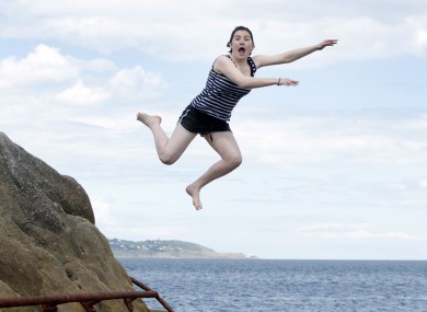 Enjoying the summer sunshine: Danielle Lowrie celebrates finishing her Leaving Cert by going for a dip at the Forty Foot in Dún Laoghaire.