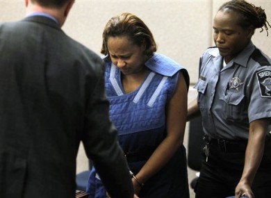 Annette Morales-Rodriguez, centre, at court in Milwaukee yesterday.