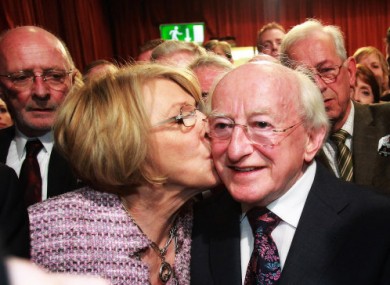 Michael D Higgins gets a kiss from wife Sabina Coyne as it becomes clear that he's in line to become President of Ireland - and for a €250,000 pay packet.