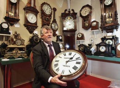 Clockmaker Oliver Walsh from Drogheda, Co. Louth, sits in his area at the Dublin Christmas Antiques Fine Art Fair in the RDS, which runs until the end of the weekend.