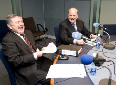 Brendan Howlin (L) and Michael Noonan on RTÉ radio this morning taking questions from the public about Budget 2012.