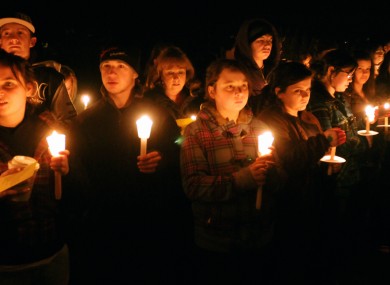 In this Jan. 15, 2010 photo, a candlelight vigil is held at South Hadley, Mass., High School for freshman Phoebe Prince, 15.