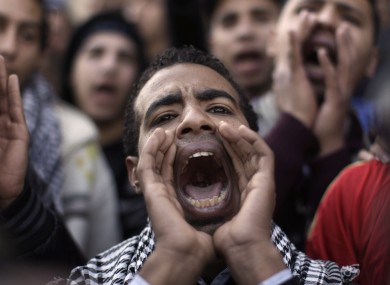 A student protester shouts anti-military slogans in Cairo today.