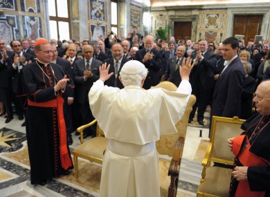 The Pope greets a private audience at the Vatican on Saturday.