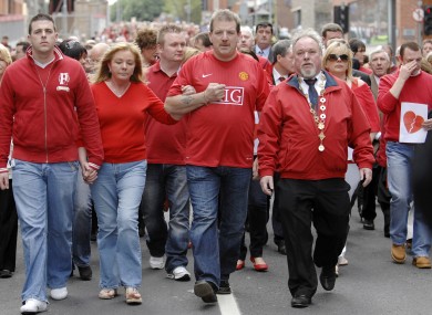 Steve Collins with his wife Carmel and brother Stephen Jr (left) in 2009, attending a march against Limerick gangland crime. The family left Ireland yesterday.