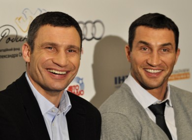 Vitali Klitschko, left, with his brother Wladimir at a Kiev news conference yesterday.