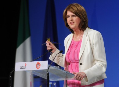 Joan Burton argues that encouraging parents to enter the workforce is the best way of helping them to gain economically.
