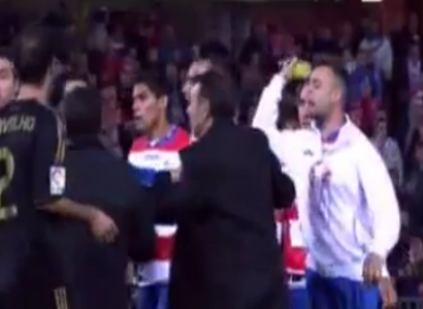 Benitez with bottle in-hand.