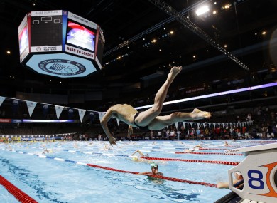 A swimmer dives during practice at the US Olympic swimming trials in Nebraska earlier today