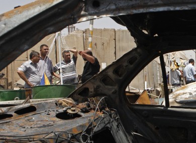 The scene of a car bomb explosion in Sadr City, Baghdad on 23 July.