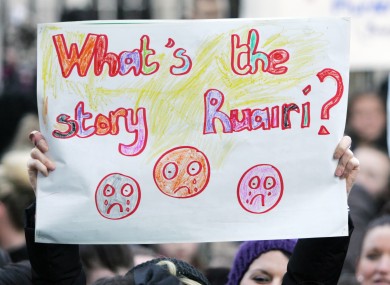 A banner held by a demonstrator against proposed cuts to teaching jobs in Deis schools last year.