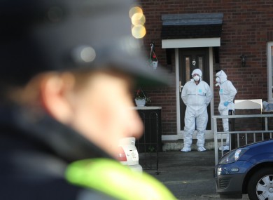 Gardaí and forensic examiners outside the house where John Wilson was shot dead last week.