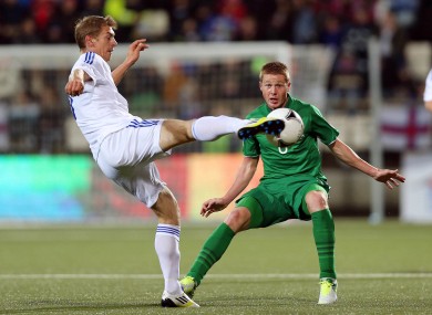 Ireland's James McCarthy and Frodi Benjaminsen of Faroe Islands tonight.