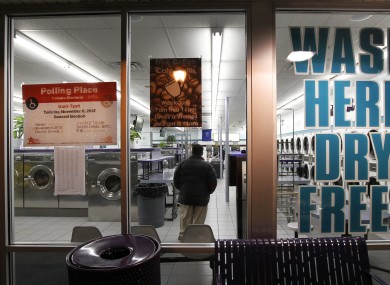 Wash, dry and vote - a Chicago Laundromat is used as a polling place.