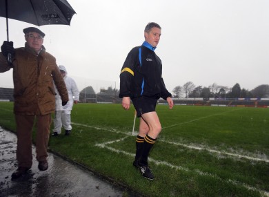 Referee Barry Kelly at Wexford Park before calling off the game.