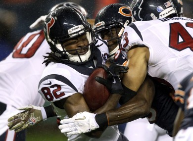 Houston Texans wide receiver Keshawn Martin (82) is tackled by Chicago Bears defensive backs.