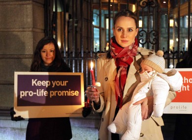 Seana Stafford and her 13-week-old son James and Stephanie McNamee during a Pro Life Campaign protest outside Leinster House in Dublin this evening.